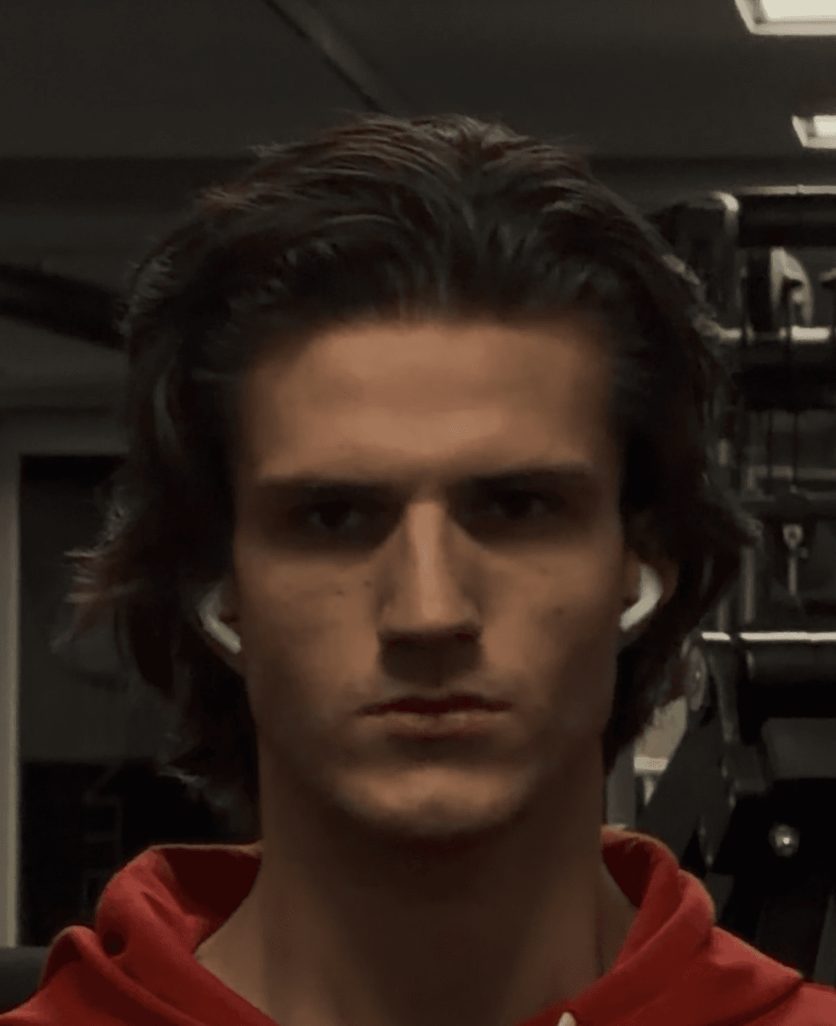 Johan Drumev in a red hoodie